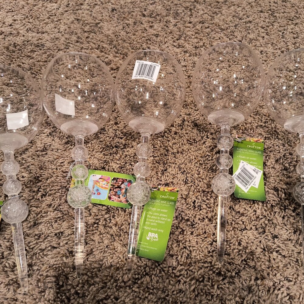 Set of 5 clear/white floating wine glasses.
